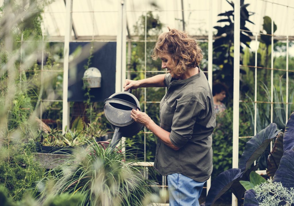 Woman working in a gardening shop