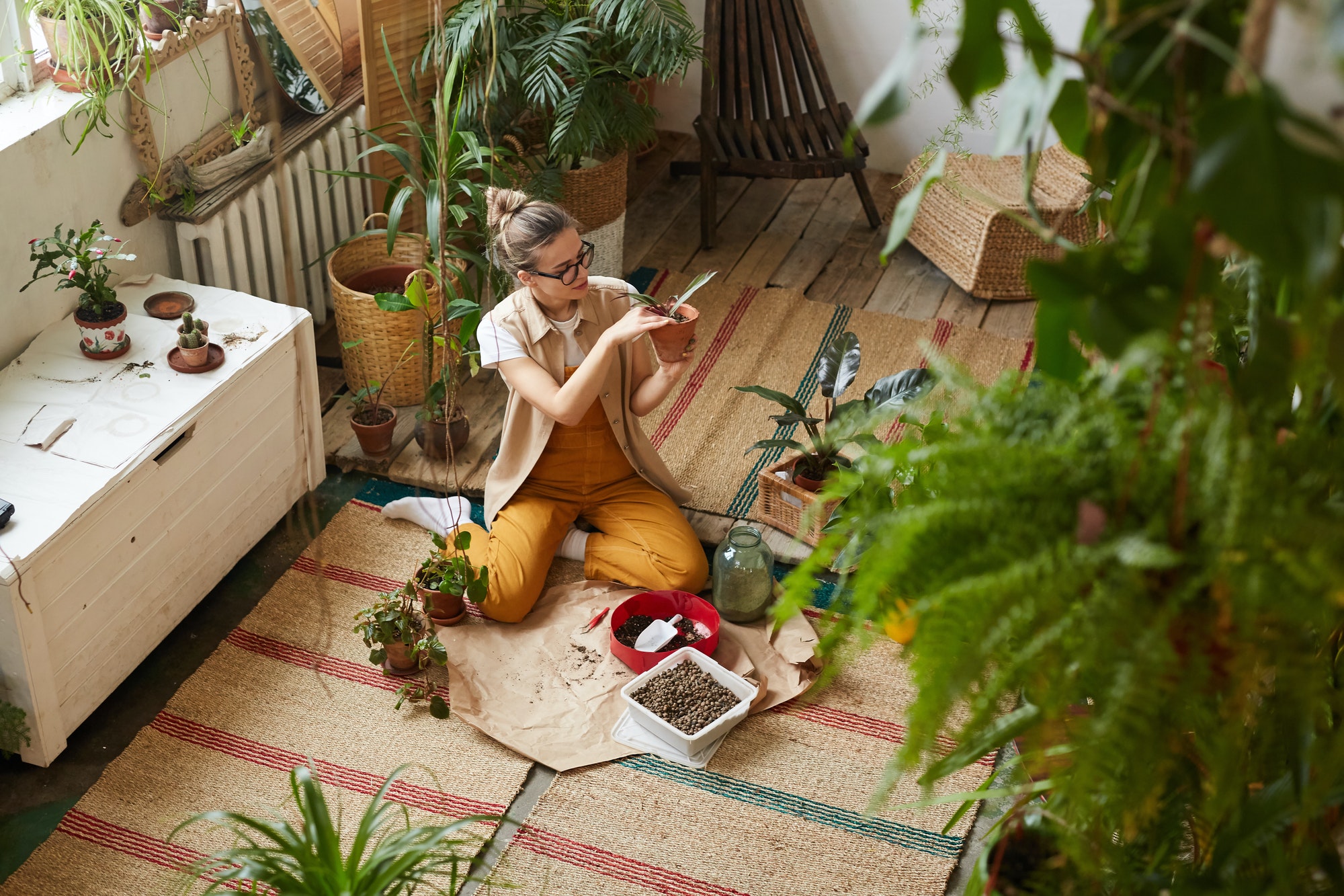 Woman working in flower garden